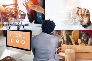Entrepreneur de dos face à un écran composé de quatre univers métiers : commerce, technologie, service et artisanat, illustrant les pistes pour trouver son idée d'entreprise