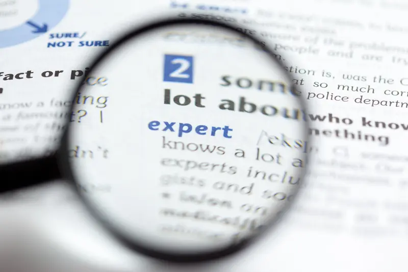 Loupe agrandissant une définition illustrant le lexique administratif
